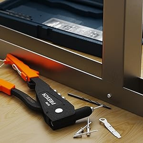 PRESCH Blindnietenzangenset mit verschiedenen Aufsätzen und Blindnieten auf einer Werkbank.