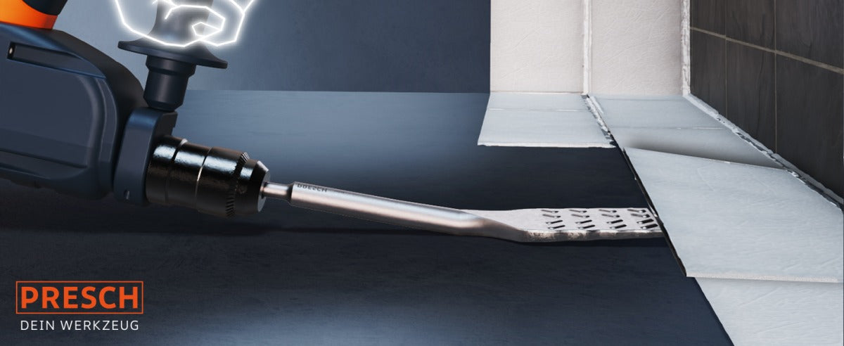 PRESCH Fliesenmeißel Werkzeug in Aktion beim Entfernen von Fliesen, präziser Fugenmeißel und Meißelwerkzeug