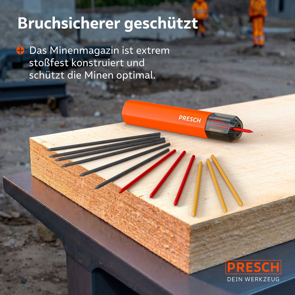 Stoßfestes Minenmagazin auf einem Holzbrett; davor sind die 12 Ersatzminen in den Farben Schwarz, Rot und Gelb für verschiedene Untergründe aufgefächert.