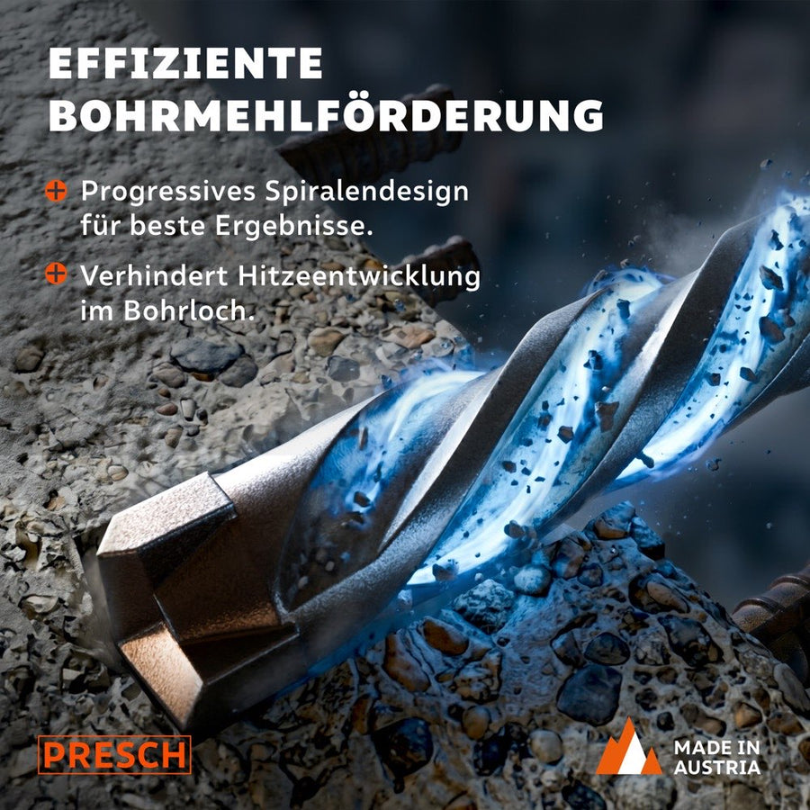 Extreme Nahaufnahme der Hartmetallspitze eines SDS-Plus Hammerbohrers beim Bohren in Beton, blaue Kühlung visualisiert den Bohrmehlabtransport