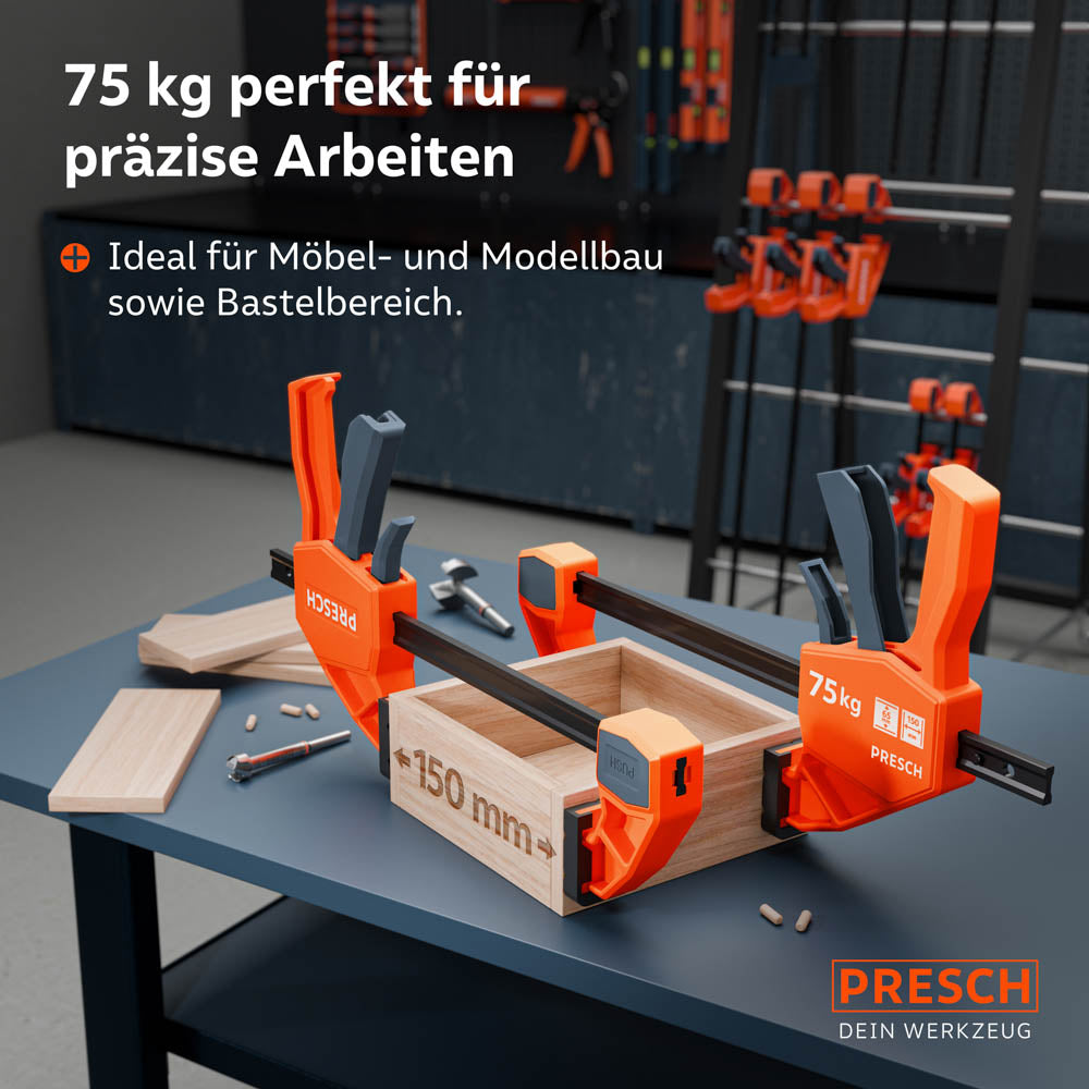Zwei PRESCH Einhandzwingen fixieren eine kleine Holzschublade auf einer Werkbank; die 75kg Spannkraft ist perfekt für Möbelbau, Modellbau und filigrane Bastelprojekte geeignet.