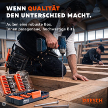 Zimmerer arbeitet mit dem Schlagschrauber an einer Holzkonstruktion, die Bitbox liegt griffbereit