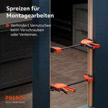 Toepassing in het interieur: twee heavy-duty klemmen worden in spreidingsmodus gebruikt om een deurkozijn tijdens de installatie stevig tegen de wand te duwen.