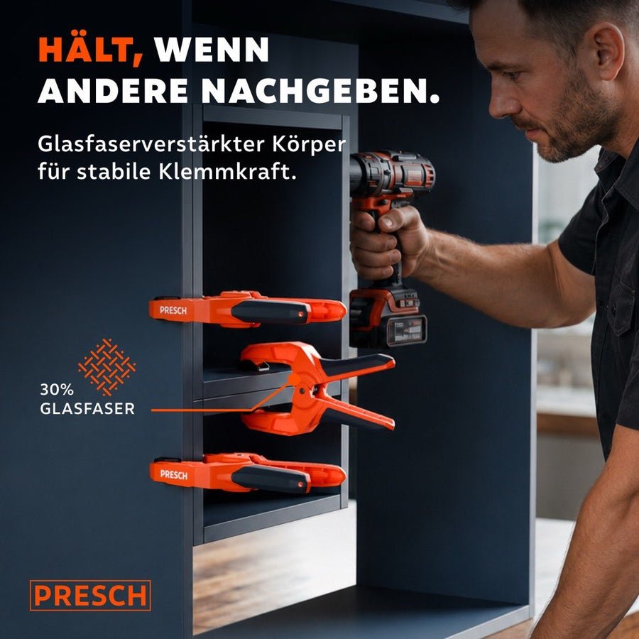 Federzwingen mit glasfaserverstärktem Körper halten ein Regalbrett, während damit gebohrt wird.