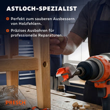 Handwerker bohrt ein Astloch aus einem Holzbein und bessert es mit einem Holzdübel aus.