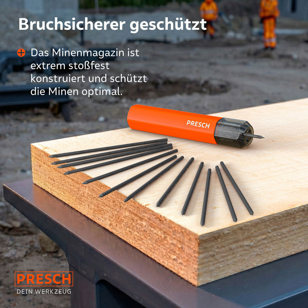 Stoßfestes Minenmagazin liegt auf einem Holzbrett auf einer Baustelle; davor sind 12 bruchsicher geschützte Graphitminen aufgefächert.