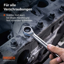 Praktische toepassing op een massieve motorblok. Het gereedschap biedt stabiele grip en veilige krachtoverdracht, zelfs onder moeilijke omstandigheden zoals vette handen of vastzittende bouten.