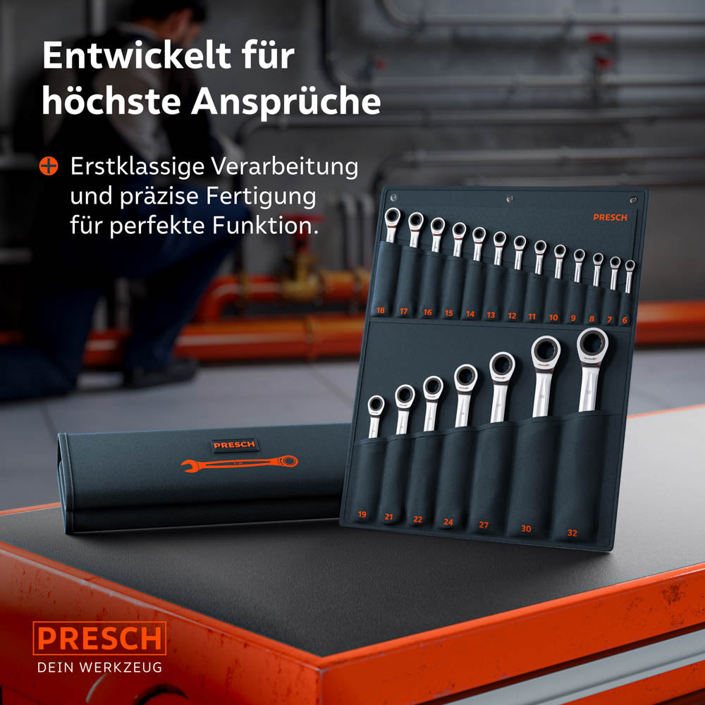Die Rolltasche mit dem 20-teiligen Profi-Set auf einem roten Werkstattwagen. Im Hintergrund arbeitet ein Handwerker an industriellen Anlagen, was die Eignung für härteste Einsätze betont.