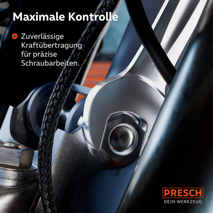 Gros plan d'une clé à douille PRESCH en utilisation sur une connexion mécanique complexe. La partie mâle, usinée avec précision, entoure parfaitement un écrou hexagonal et assure une transmission de puissance fiable lors de travaux de vissage délicats.