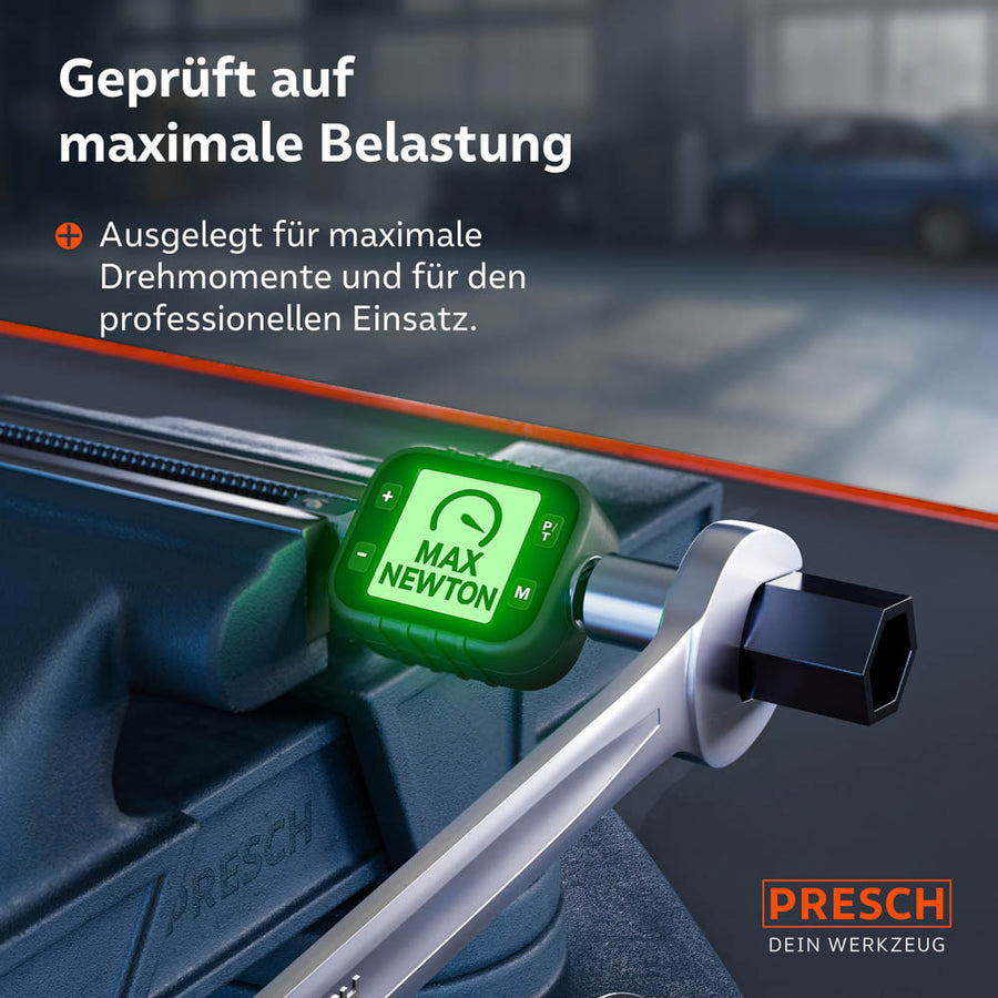 Test de charge d'une clé dans un étau avec dispositif de mesure numérique du couple. L'ensemble est conçu pour des couples extrêmes et une utilisation industrielle continue.