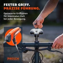 Hand umfasst den gummierten T-Griff beim Einstellen eines Fahrradlenkers