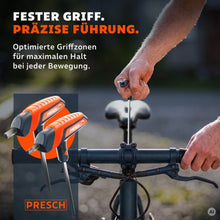 Twee handen stellen met T-greep sleutels een fietsstuur recht